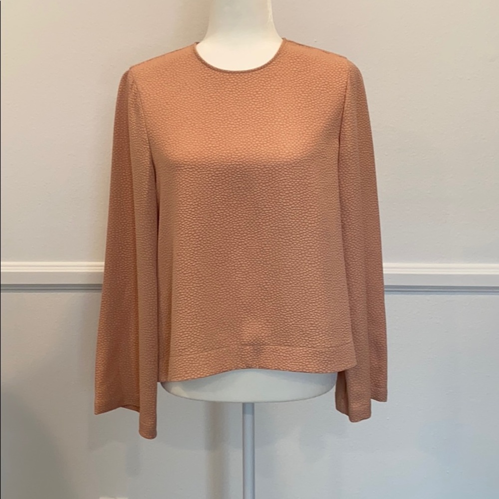 Textured fabric blouse.